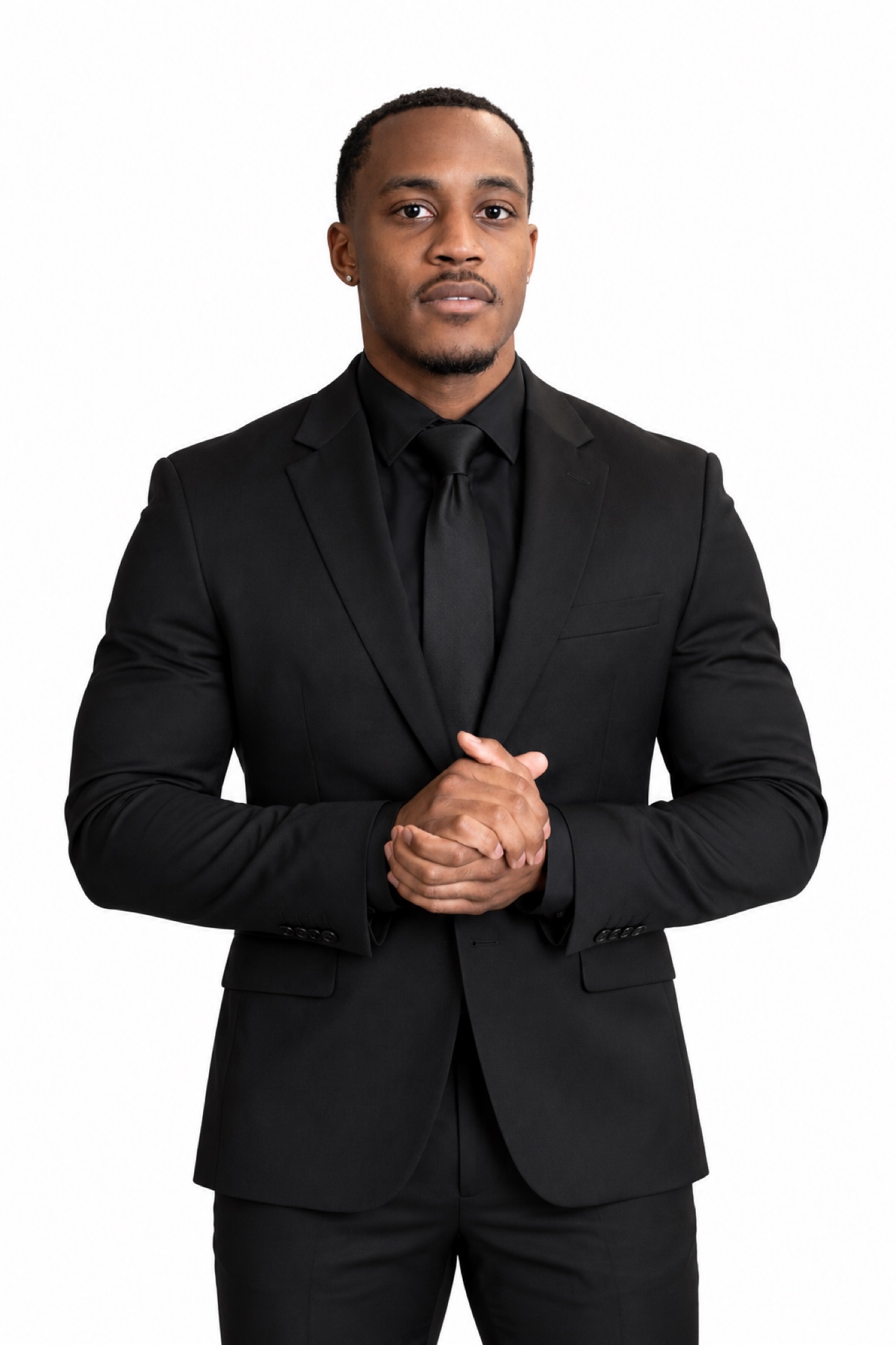 Nigel Freeman, founder of NXTLVL Finance Solution, photographed with hands clasped